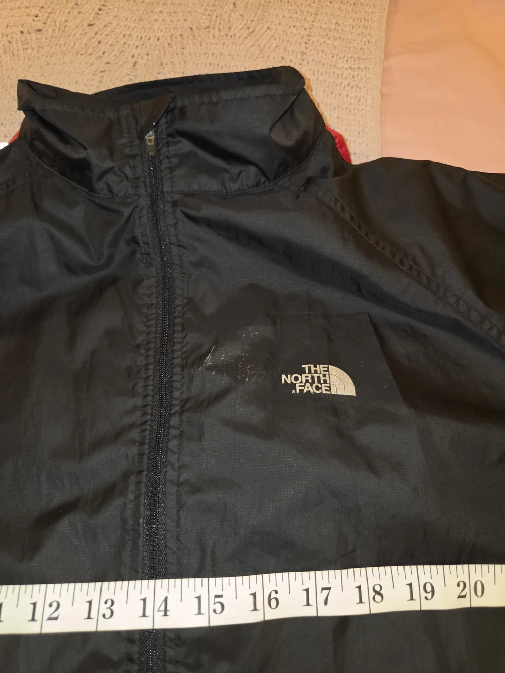 The North Face Men’s Black Windbreaker with Red Trim